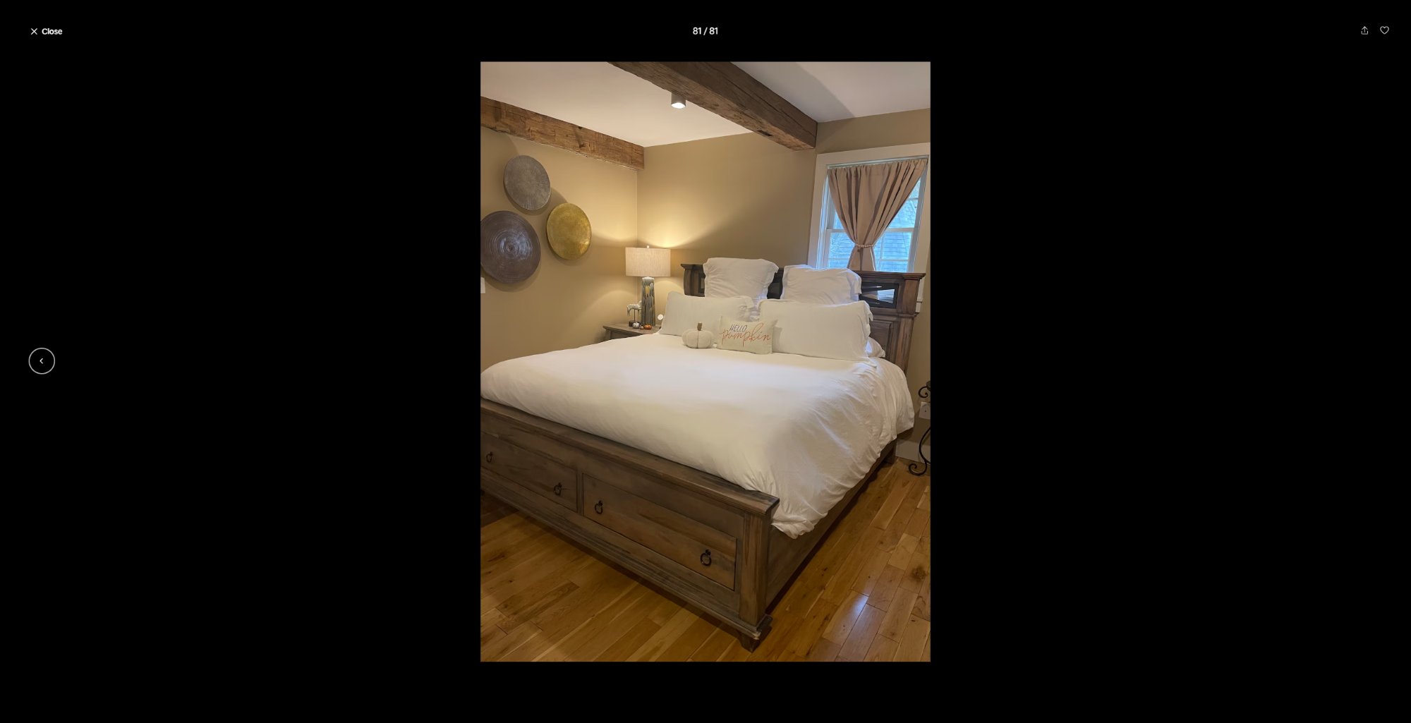 King bedroom with exposed beams